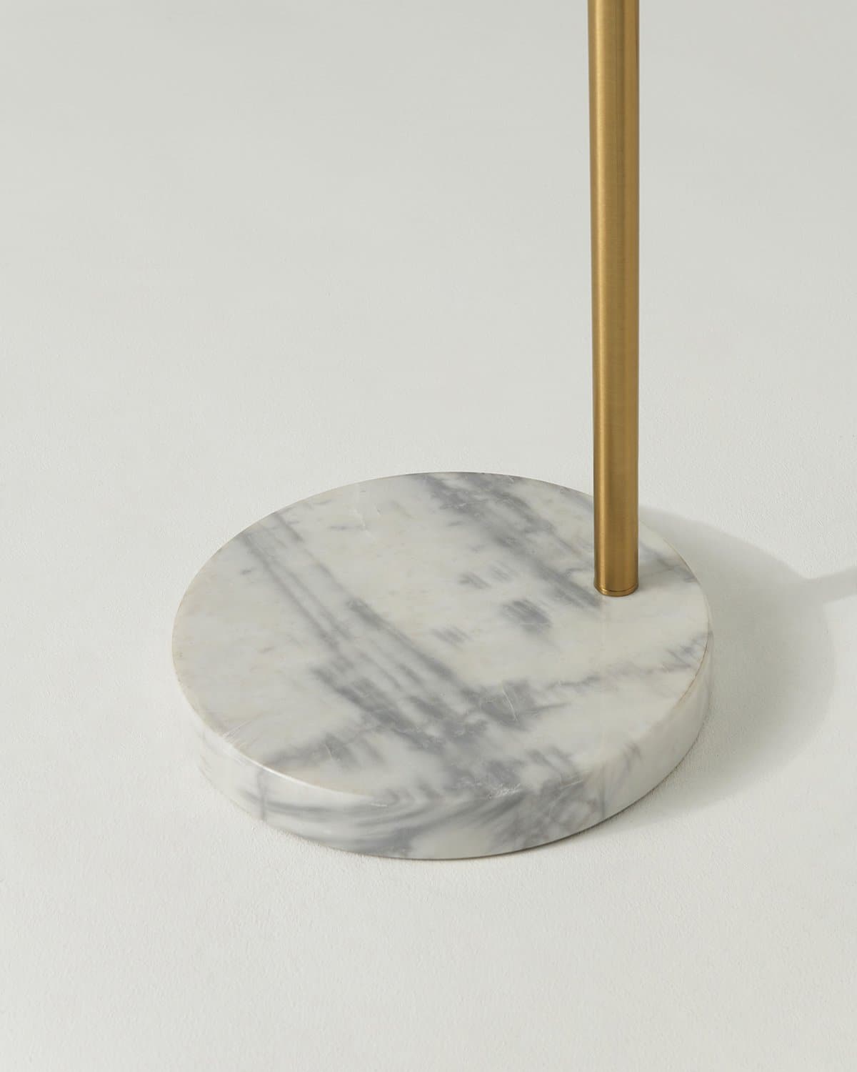 Olivia Floor Lamp with a marble base, arching swoop graceful