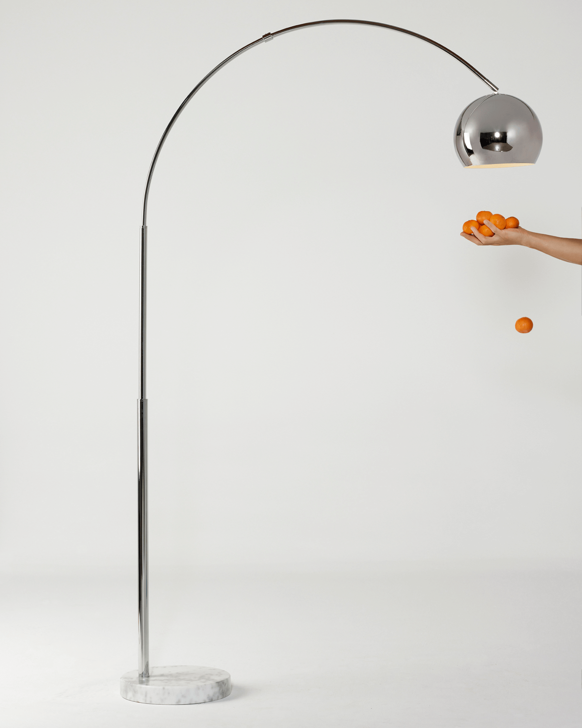 Olivia Floor Lamp with a marble base, arching swoop graceful