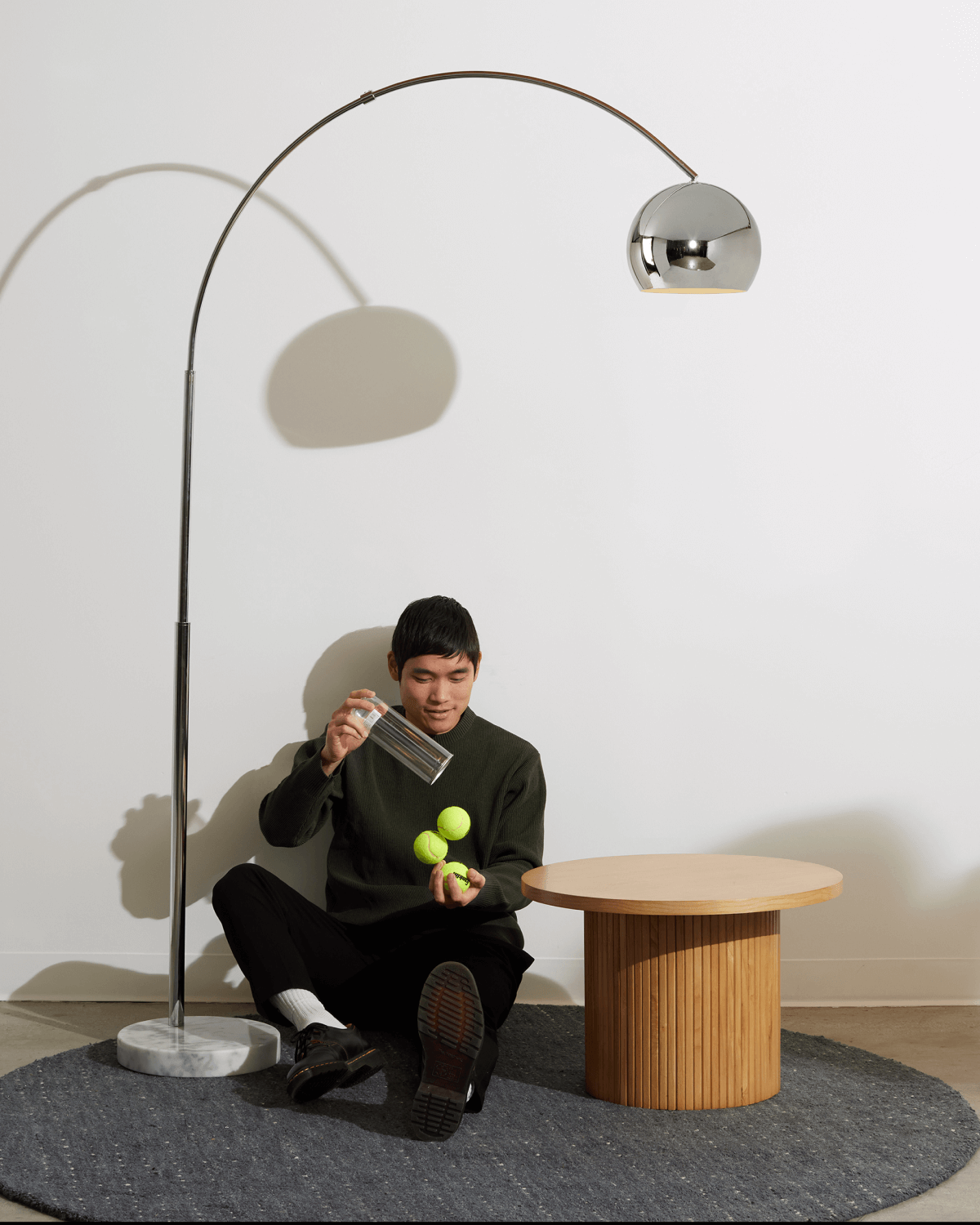 Olivia Floor Lamp with a marble base, arching swoop graceful