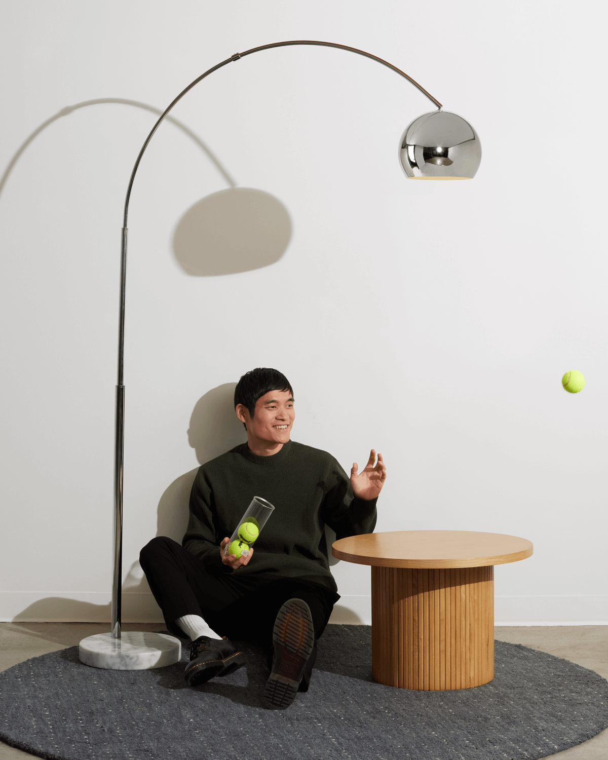 Olivia Floor Lamp with a marble base, arching swoop graceful